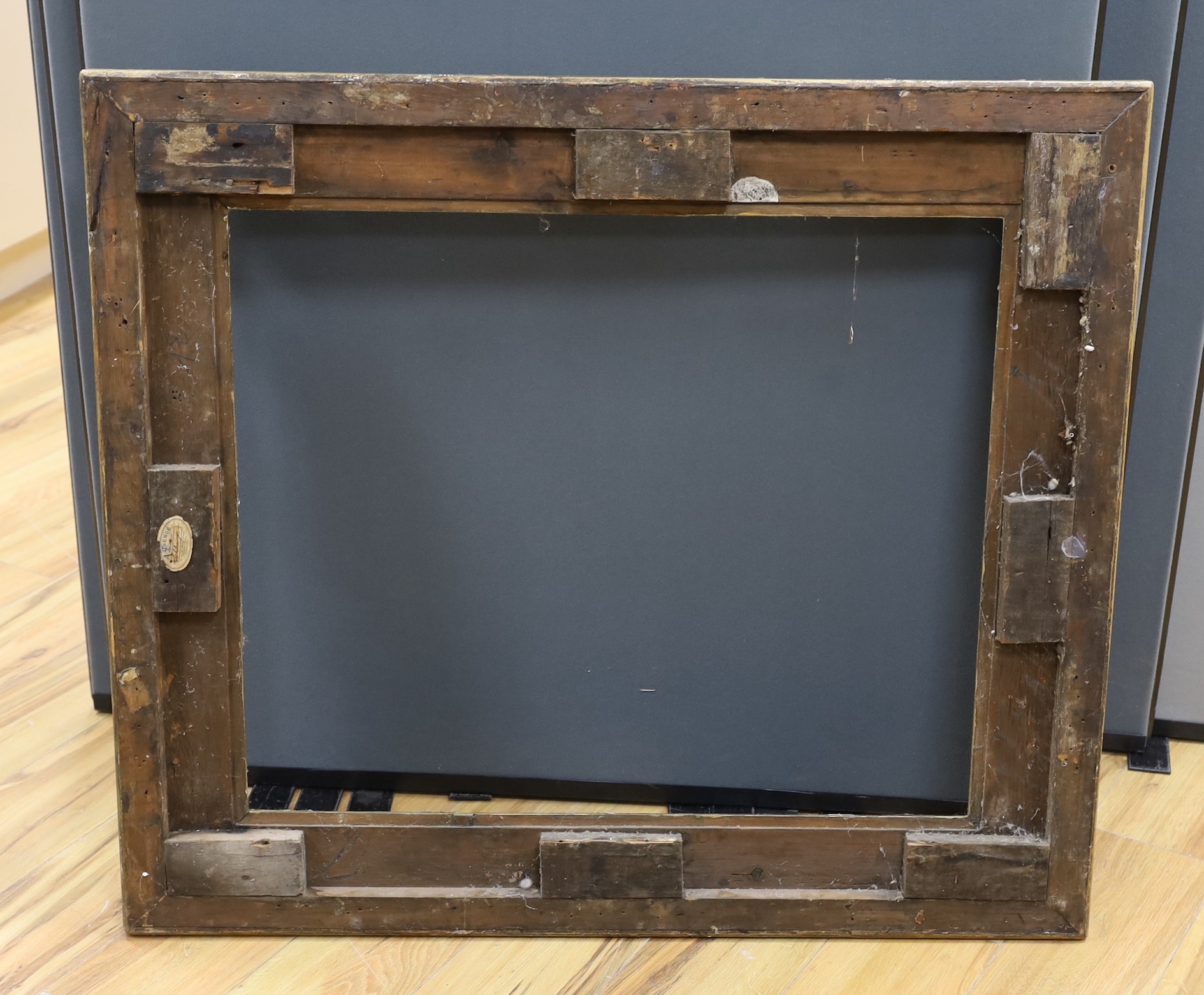 An ornate painted gilt picture frame, 90 x 100cm overall